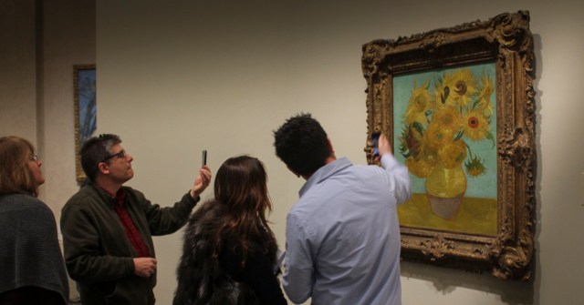 Patrons photograph one of the Philadelphia Museum of Art's most popular paintings. vangogh_sunflowers-1